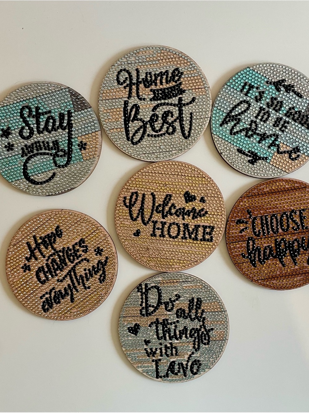 7 Round Coasters Set in Blue, Tan, Gold and Brown Bedazzled